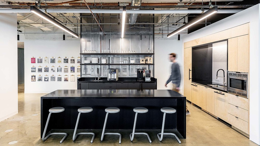 A person walking in a room.