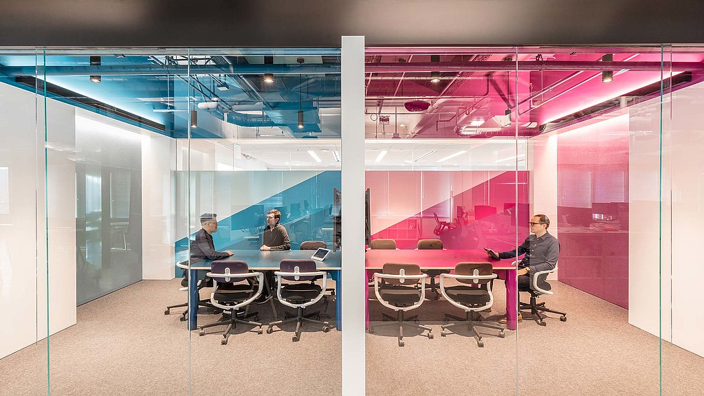 A group of people sitting at a table.