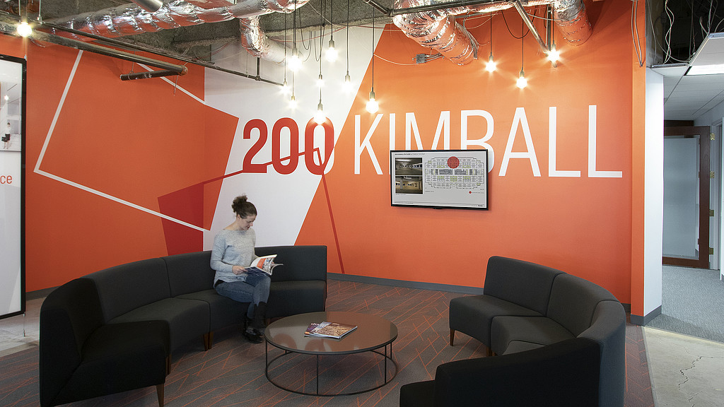 A person sitting on a couch.