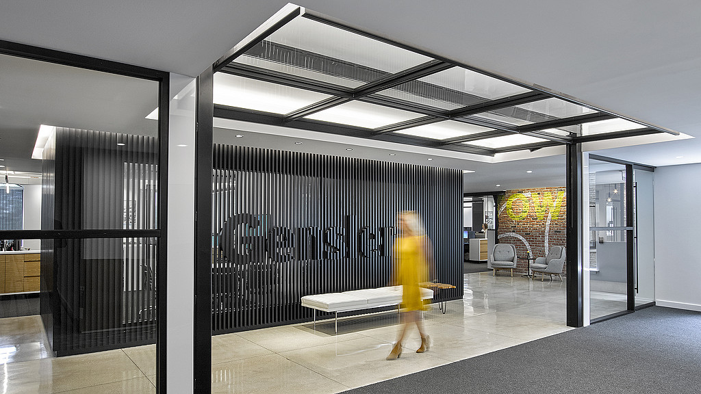 A person walking in a room.