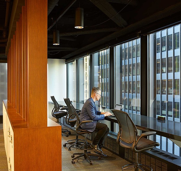 A person sitting at a desk.