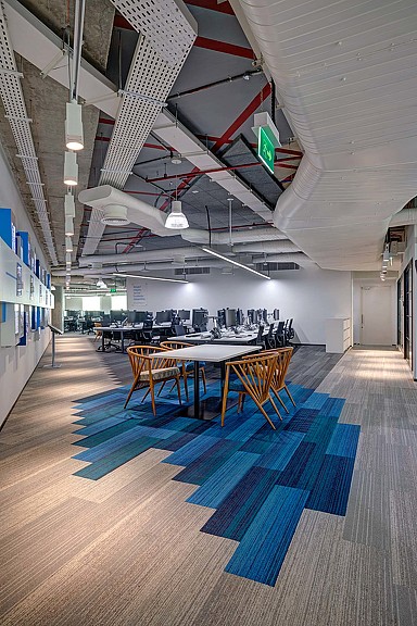 A room with tables and chairs.