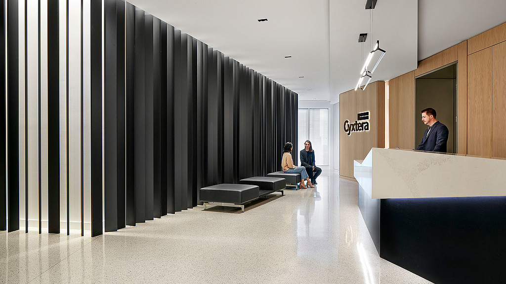 A group of people in a room.