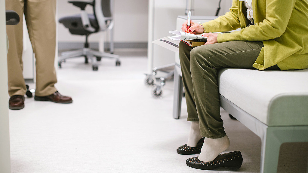 A person sitting on a chair.