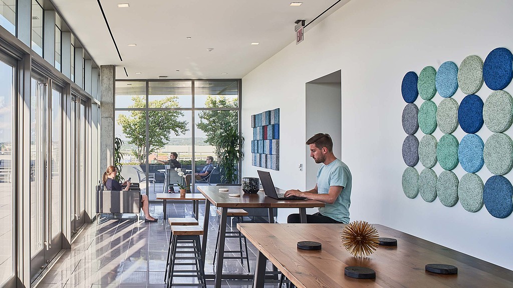A person working on the laptop.