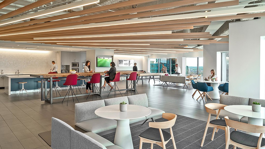 A room with tables and chairs.