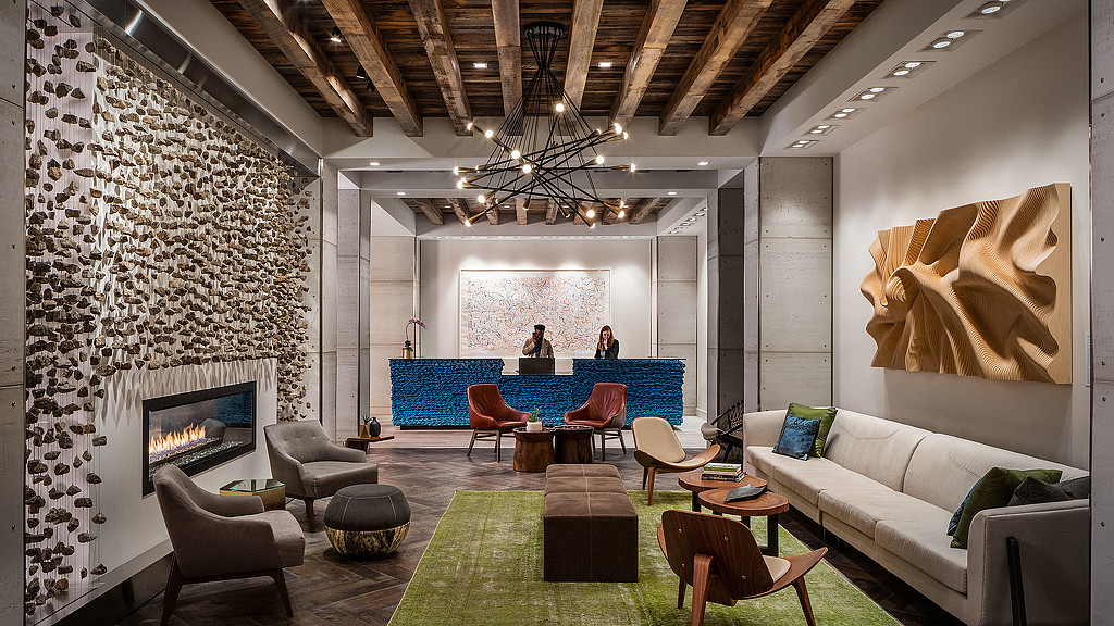 A living room with a fireplace.