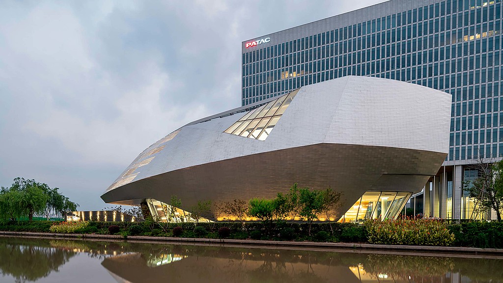 A building with a glass front.