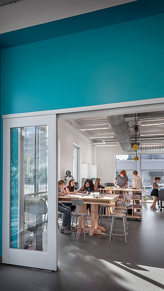 A group of people sitting at a table.