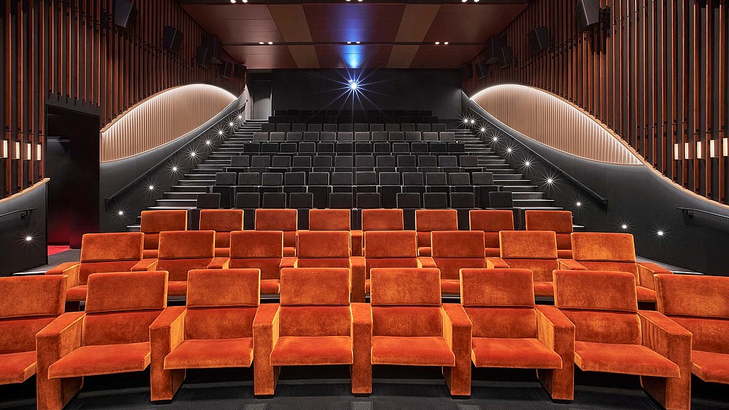 An empty theater with a stage.