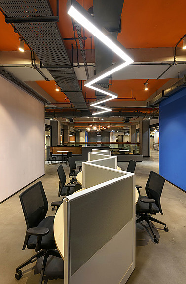 A room with a table and chairs.