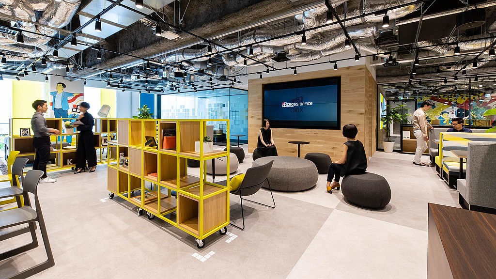 A group of people in a room.