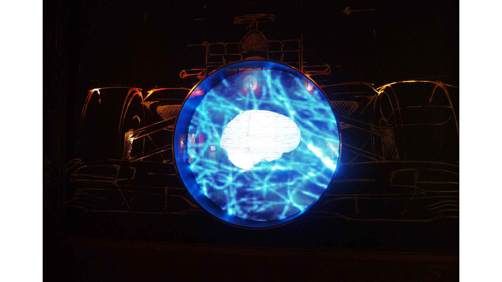 A colorful light in a dark room.