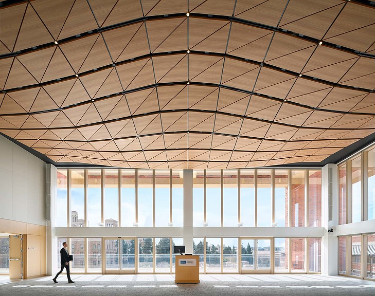 A person walking in a large building.