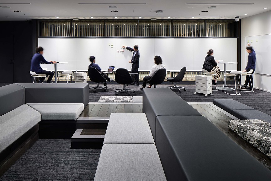 A group of people in a room.