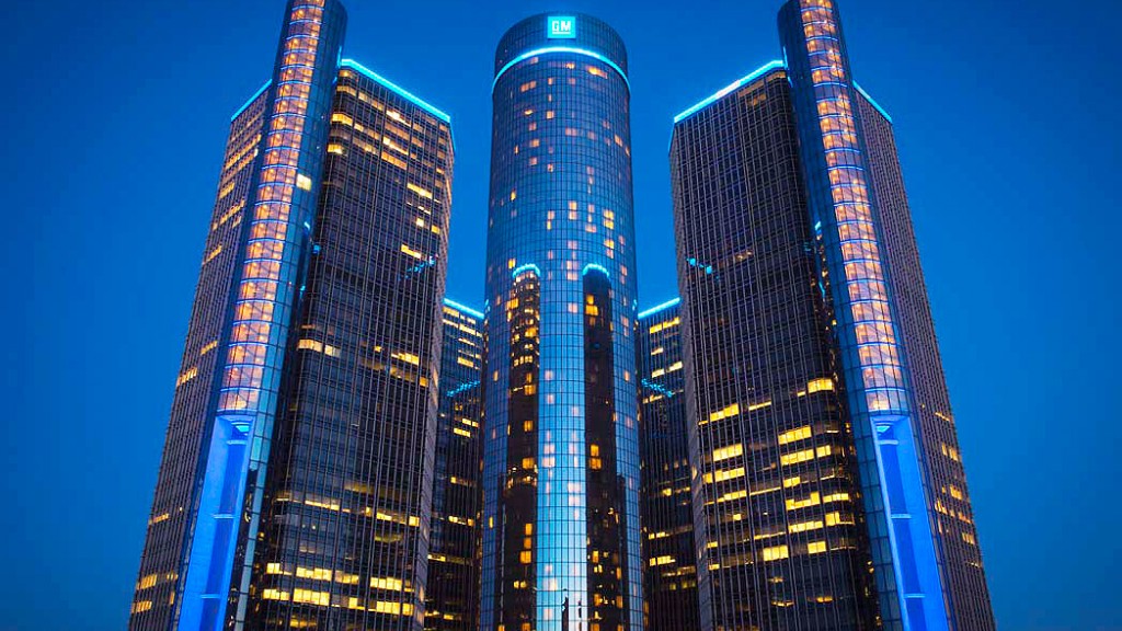 A few tall buildings with lights on.