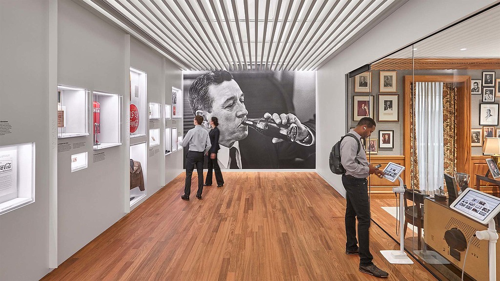 A group of people in a museum.