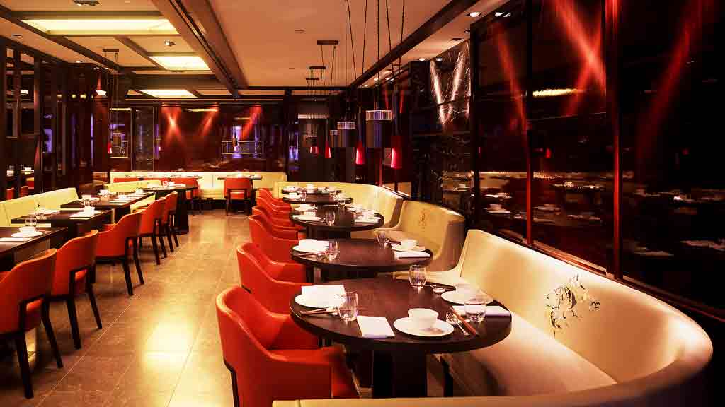 A room with tables and chairs.