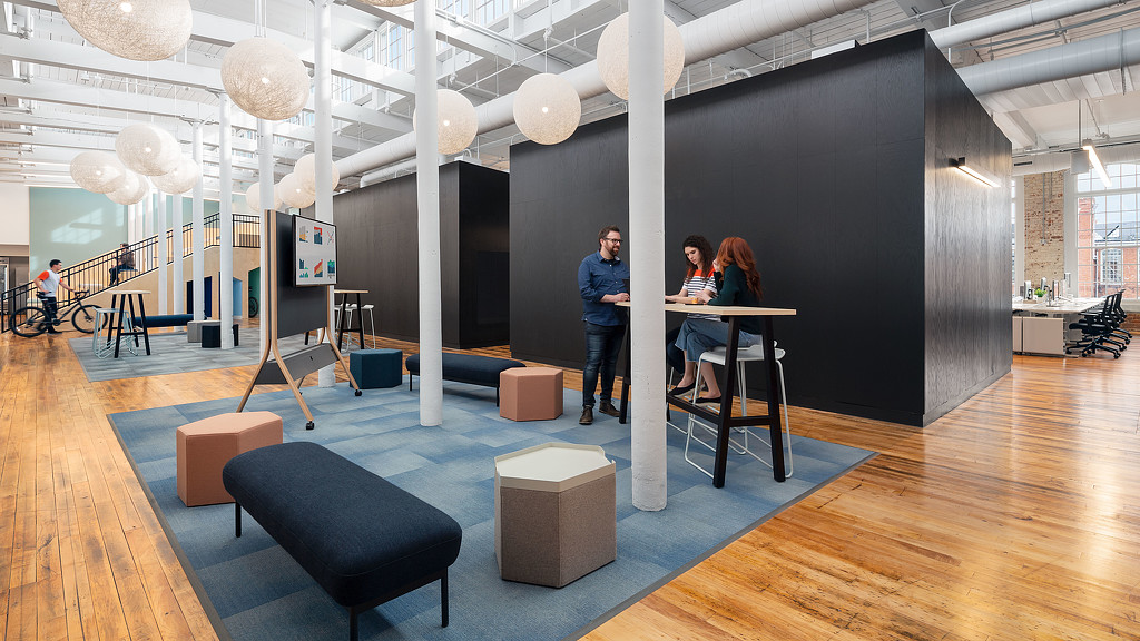 A group of people in a room.