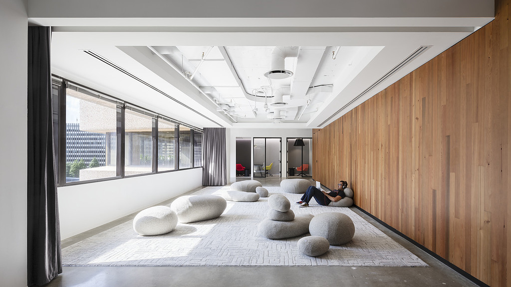 A person lying on a bed.