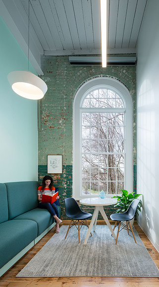 A person sitting on a couch.