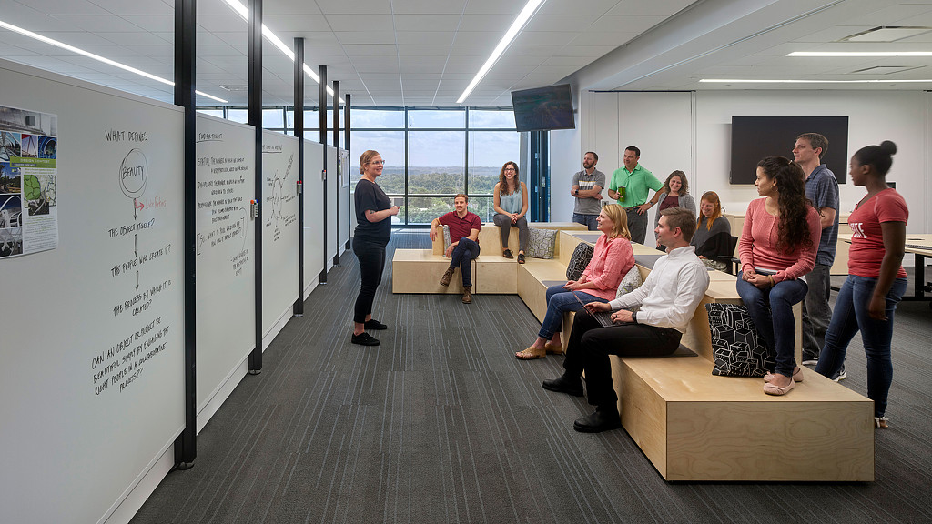 A group of people in a room.