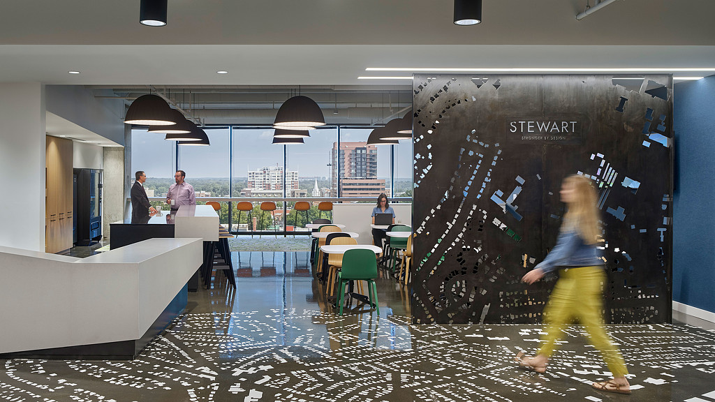 A person walking in a large room.