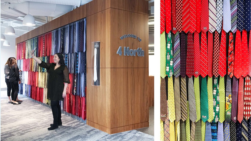 A person standing next to a door.