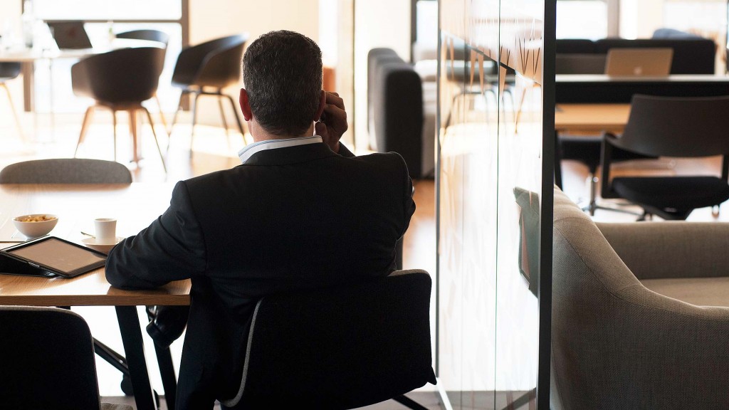 A man sitting at a desk.