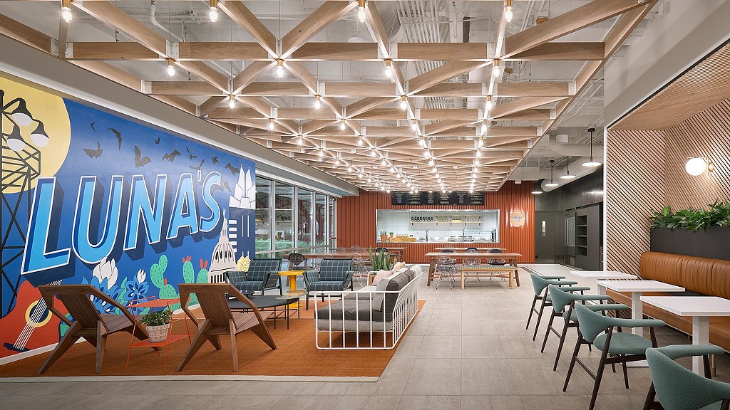 A room with tables and chairs.