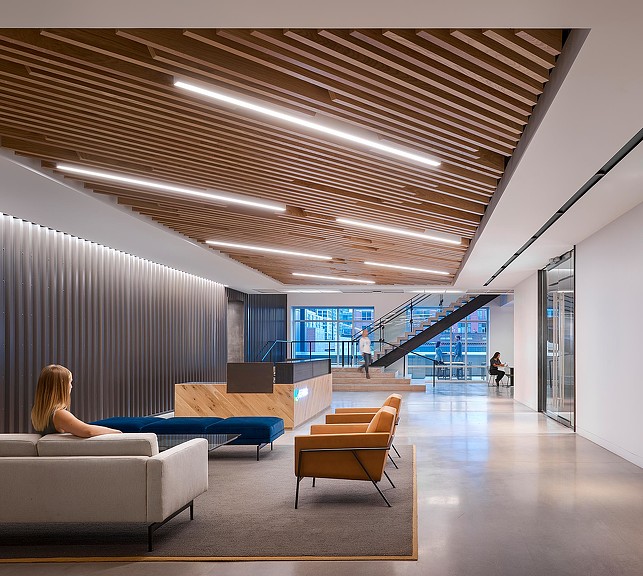 A person sitting on a couch.