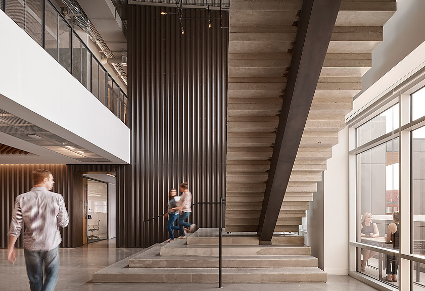 People walking up stairs.