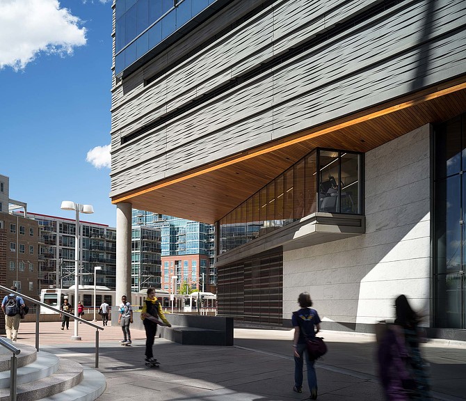 People walking on a sidewalk.