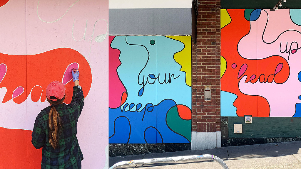 A person painting a wall.