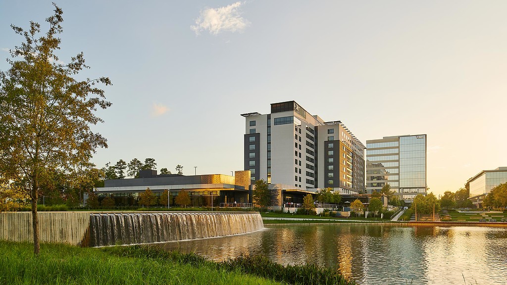 A body of water with buildings along it.