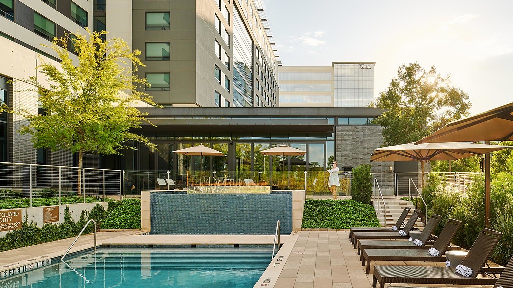 A pool in a courtyard.