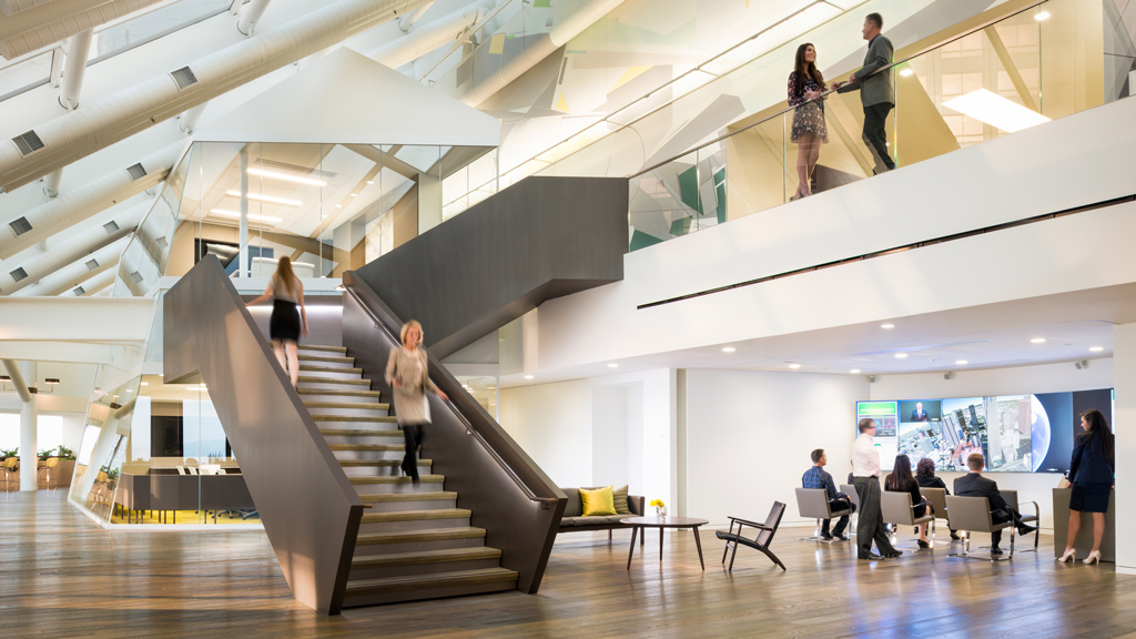 People walking up a staircase.