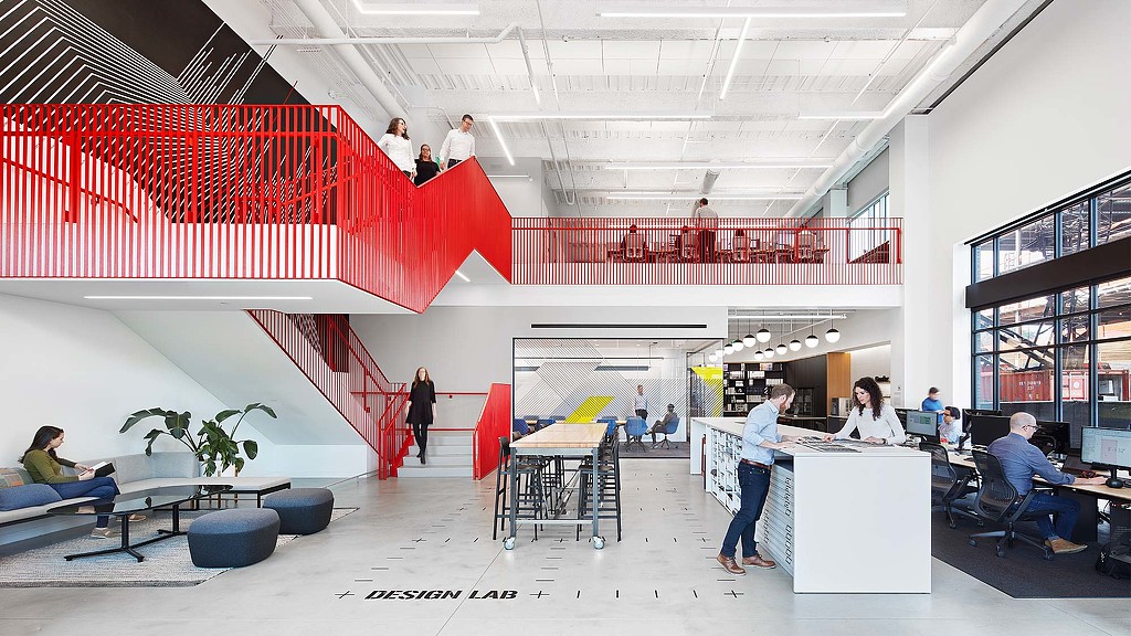 A group of people in a building.