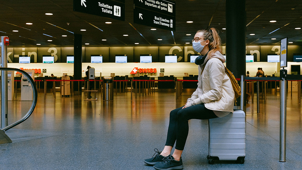 A person sitting on a bench.