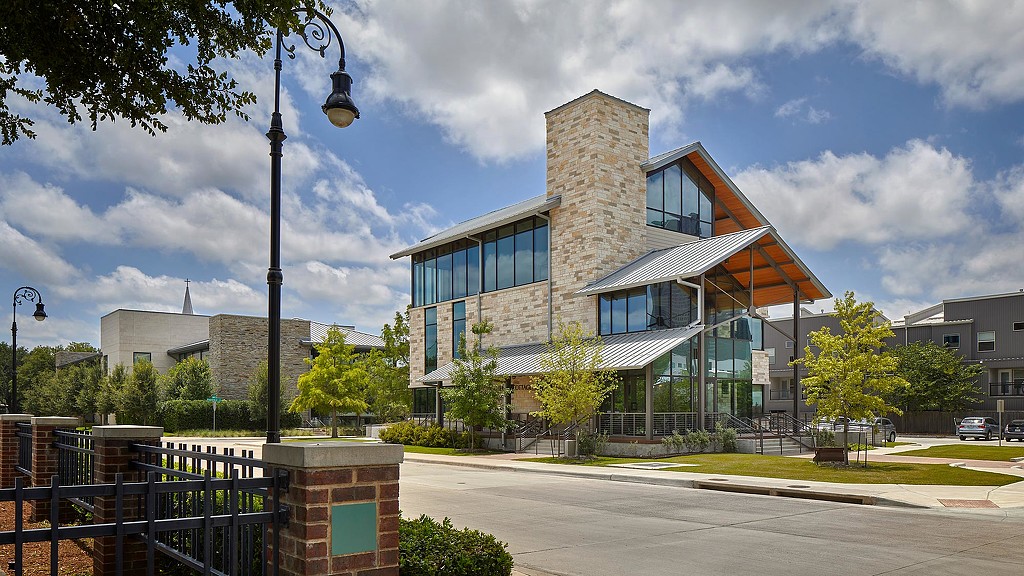 A building with a parking lot.
