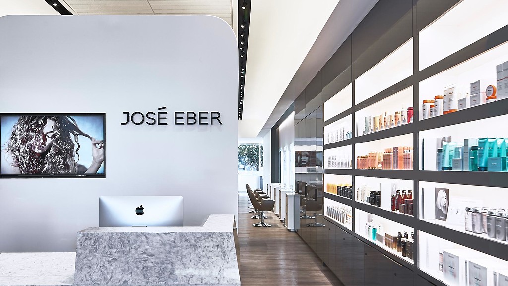 A room with a laptop and a monitor.