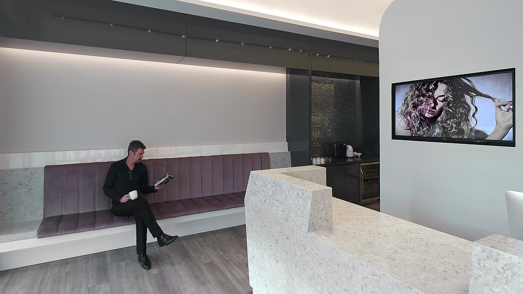 A person sitting on a couch.