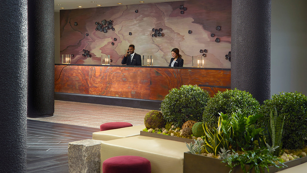 A man and woman at a podium.