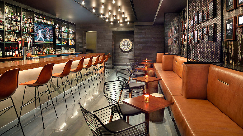 A room with chairs and tables.