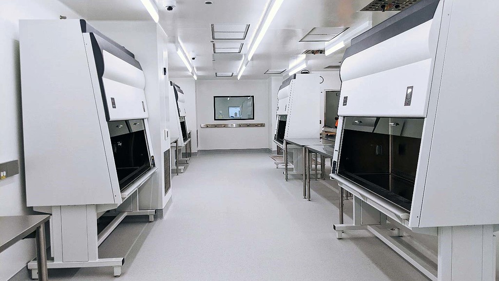 A room with white cabinets.