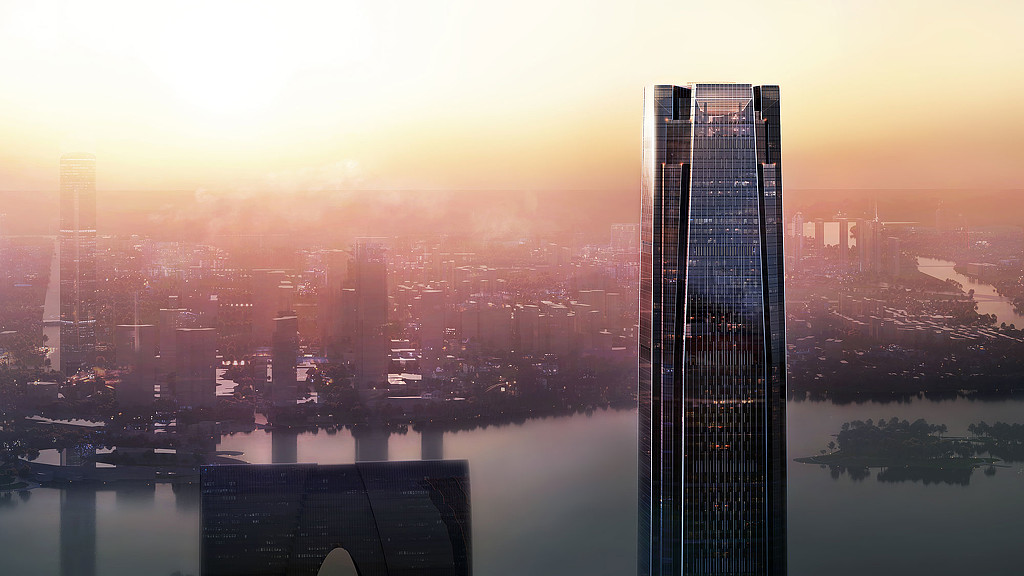 A city skyline with a body of water in the foreground.
