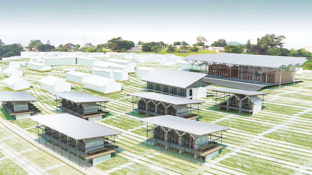 A building with a grass field.