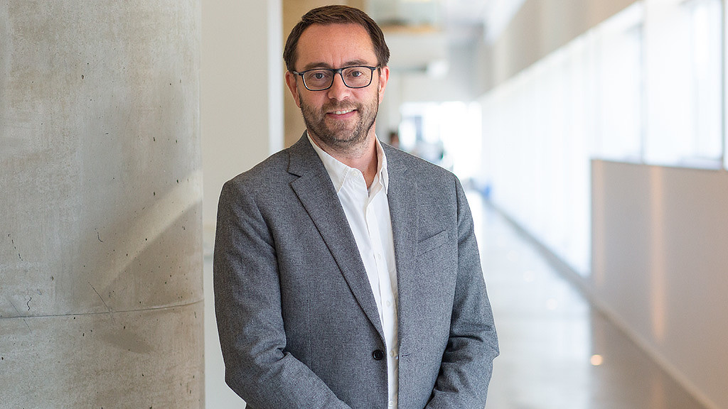 A headshot of Jonathan Emmett