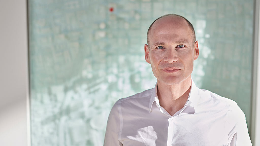 A man in a white shirt.