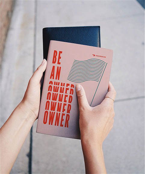 A person holding a box.